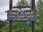 Great Alaska Escape 2026: Days 33–35

Our next travel day brought us to Homer, where we camped right on the Homer Spit with Kachemak Bay and the surrounding mountains as our backdrop. After a full day on the road, we were happy to settle in beside the water, explore the lively harbor and charming shops, and enjoy the waterfront scenery that makes this corner of Alaska so special.

One of our biggest Homer adventures was Mike’s halibut-fishing trip. He headed out by boat with 16 others from our group to try their luck in waters famous for these enormous flatfish. The outing was a success: everyone returned with fish for the freezer and a new understanding of why Homer is known as the Halibut Fishing Capital of the World.

At the Alaska Islands & Ocean Visitor Center, we learned more about the region’s wildlife, coastal ecosystems, and the remarkable species that depend on them. The exhibits deepened our appreciation for the landscapes we enjoyed throughout our stay. We also drove north to Anchor Point, the westernmost point on North America’s connected highway system. It was a fun roadside milestone, and another reminder of just how far this journey had taken us.

Back at the campground, we shared a meal, gathered around the campfire, and soaked up the peaceful beauty of our spot beside the ocean. It was the perfect ending to our time in Homer.

#RVLife #RVLiving #Adventure #Alaska #AlaskaTravel #GreatAlaskaEscape #HomerAlaska #HomerSpit #KachemakBay #HalibutFishing #AnchorPoint #RoadTripAlaska #AlaskaWildlife #RVTravel